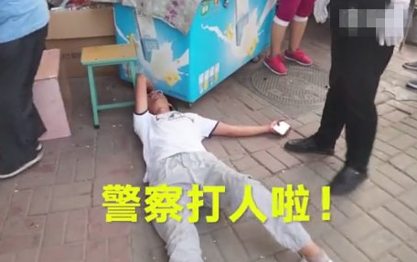 男子骑摩托车闯红灯反讹交警390元？